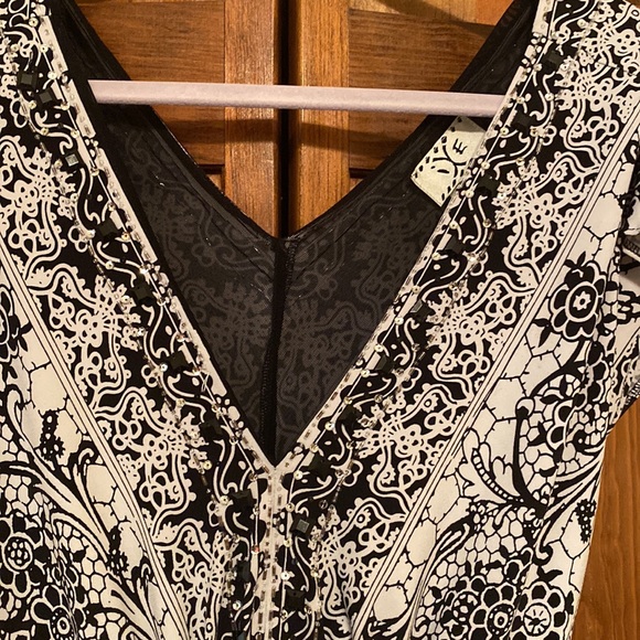 Black/white dress with sequins, black beading at the neckline, ties in the back. - Picture 2 of 3